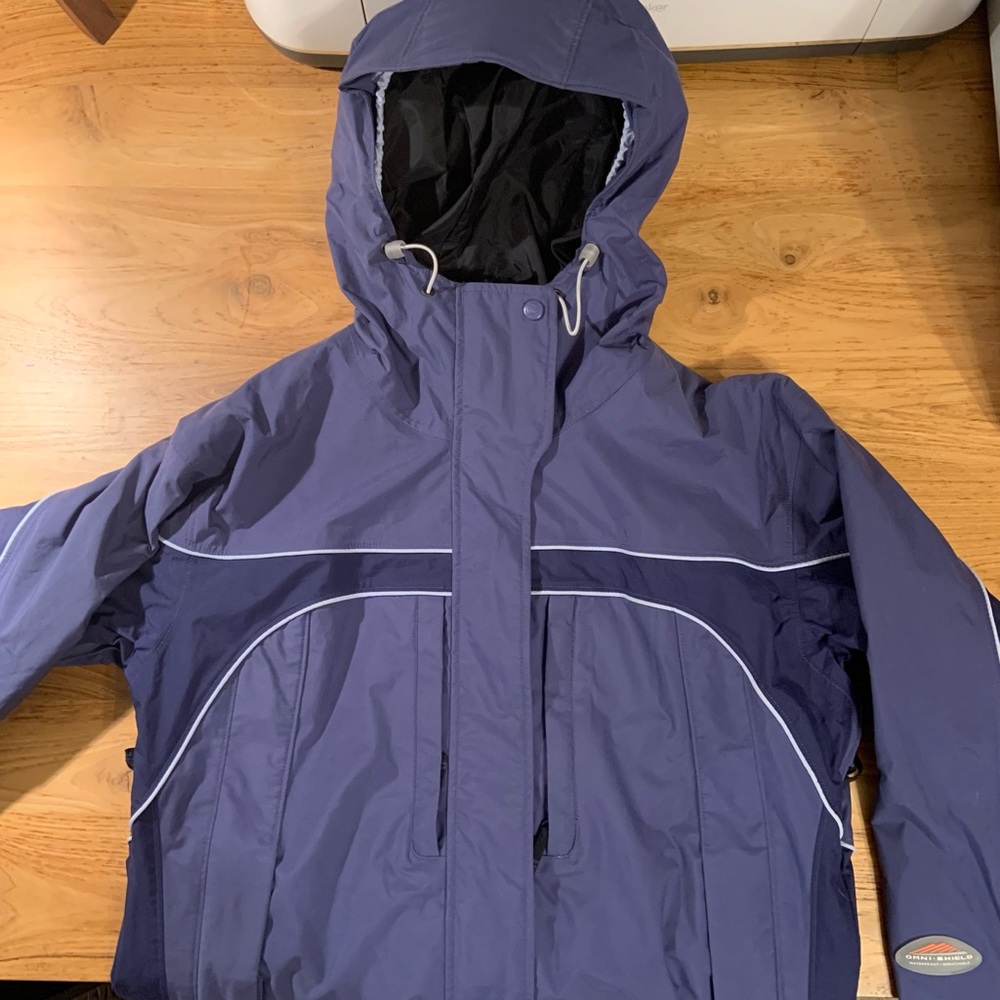 Ladies Columbia rain jacket with hood. Size Lg. NWOT. Zipper and button closure